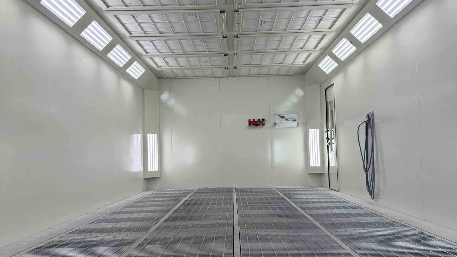 Inside the Fineline spray booth in Reservoir, lit and empty