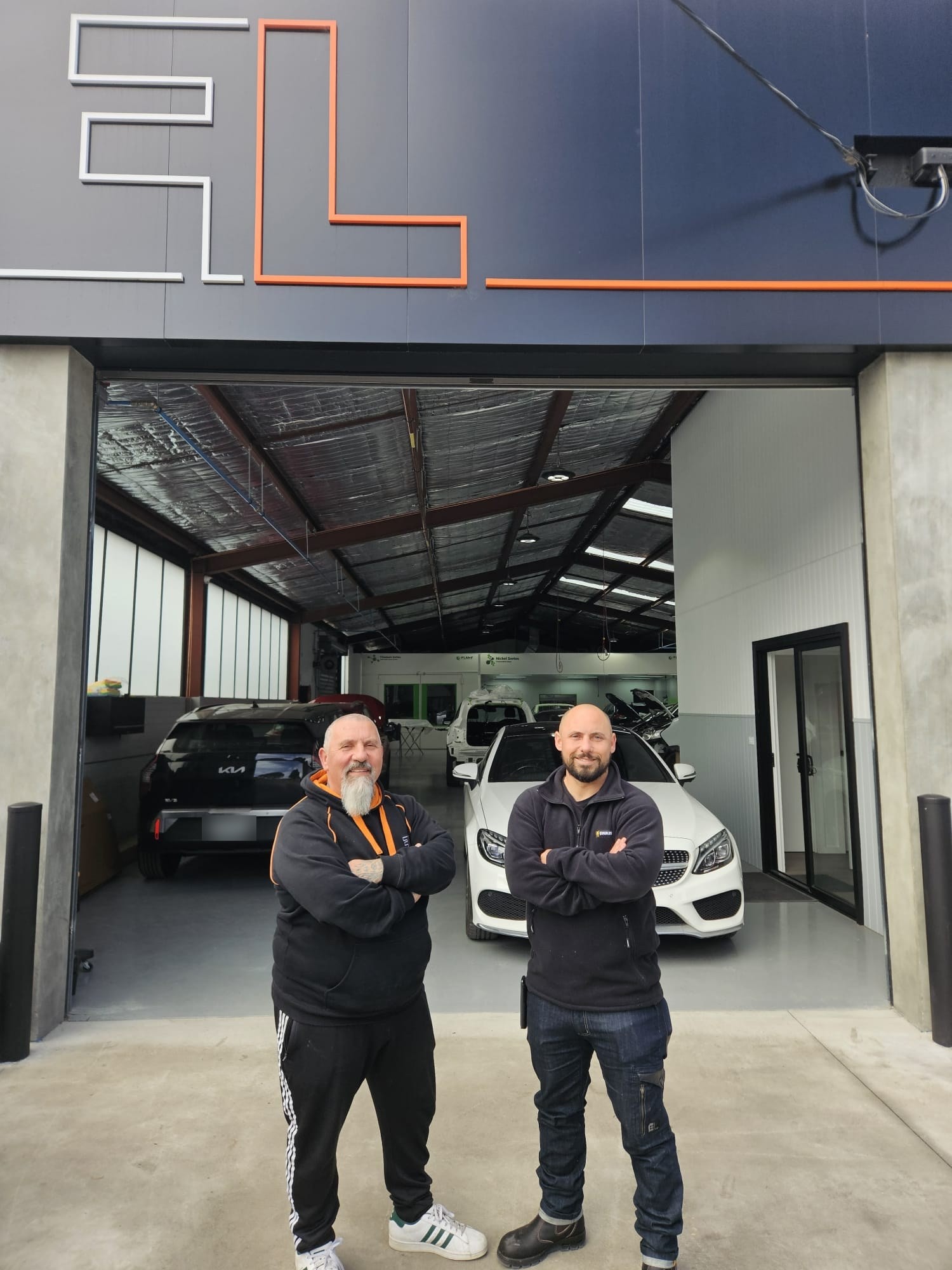 Naz and Louis outside the Fineline workshop in Reservoir